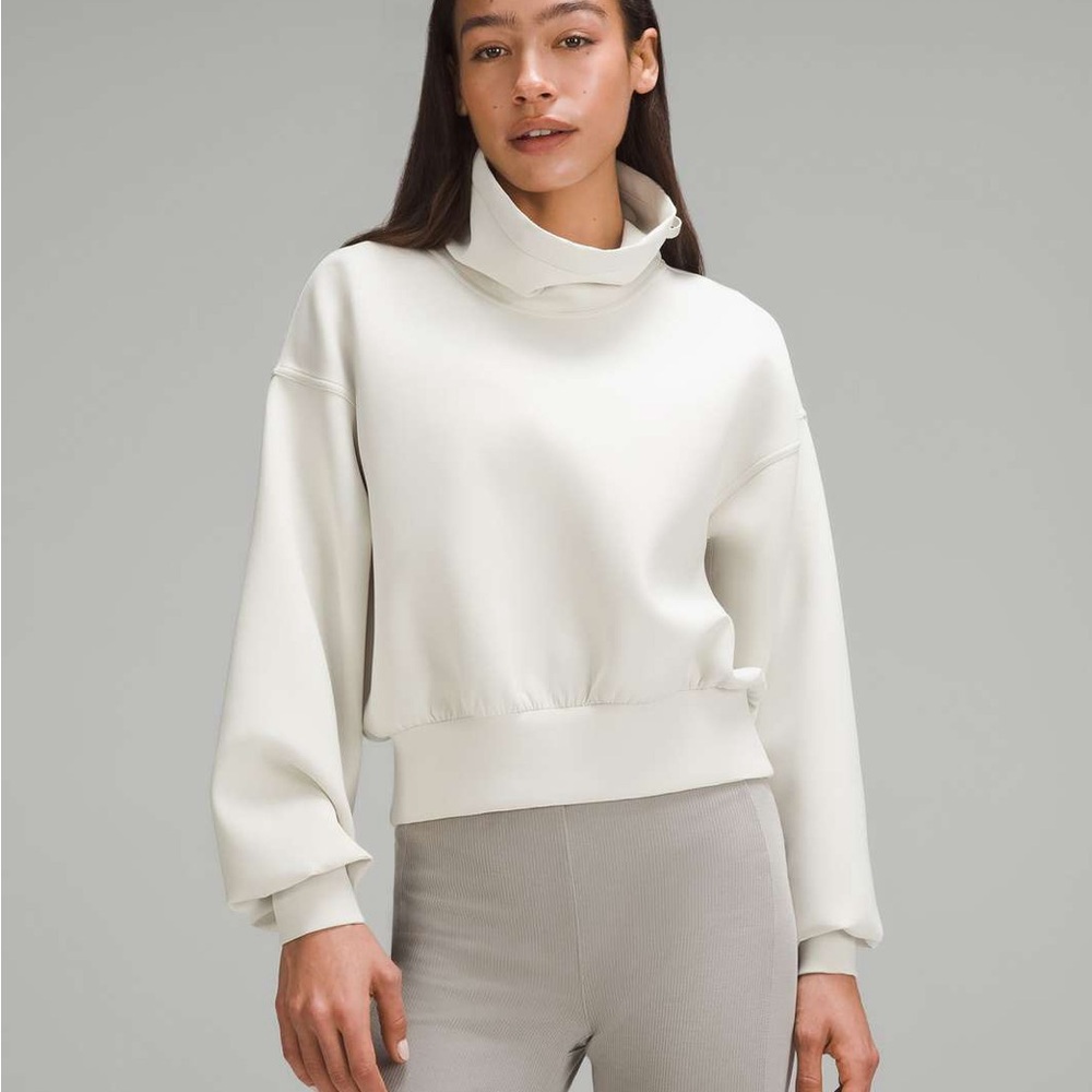 NWOT Lululemon Full Flourish Pullover in Bone, Size 10.